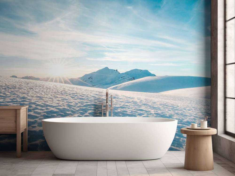 Ochtendzon over glinsterende sneeuwvlaktes