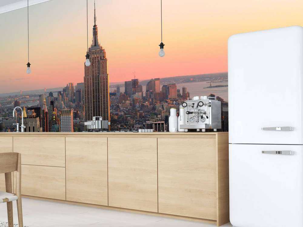 De Skyline van New York bij zonsondergang