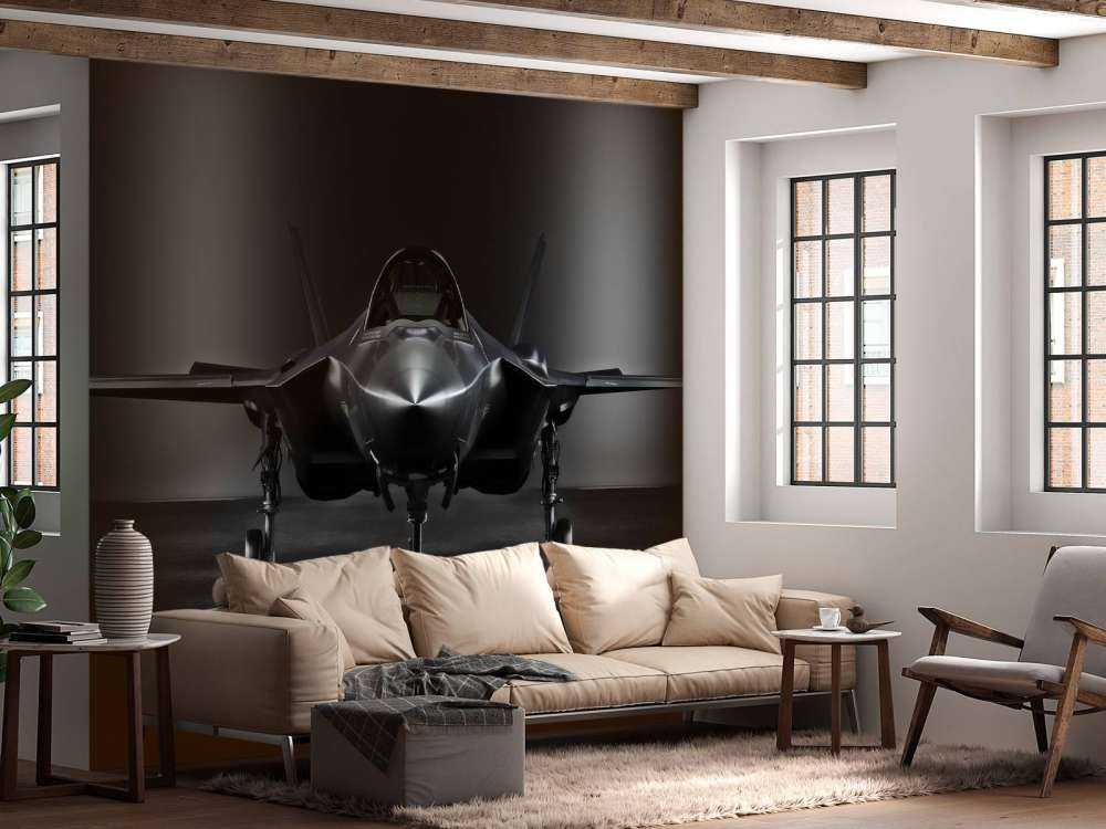 Zwarte F35 in een donkere ruimte