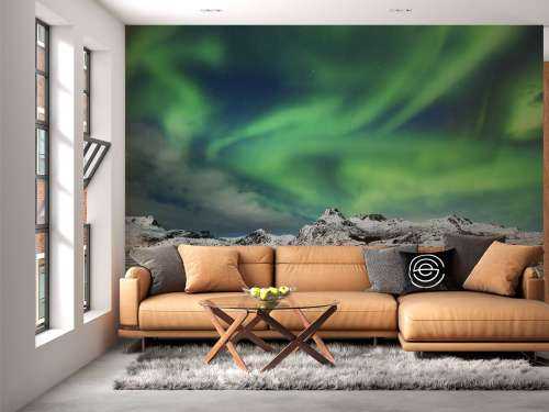 Noorderlicht boven winterlandschap