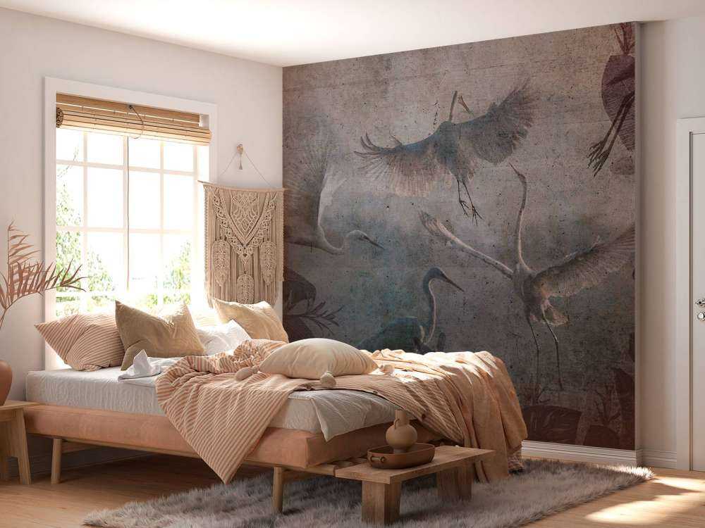 Vliegende reigers in schemerblauw