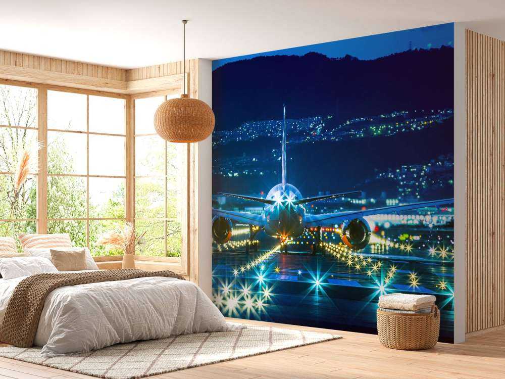 Vliegtuig op een verlicht vliegveld