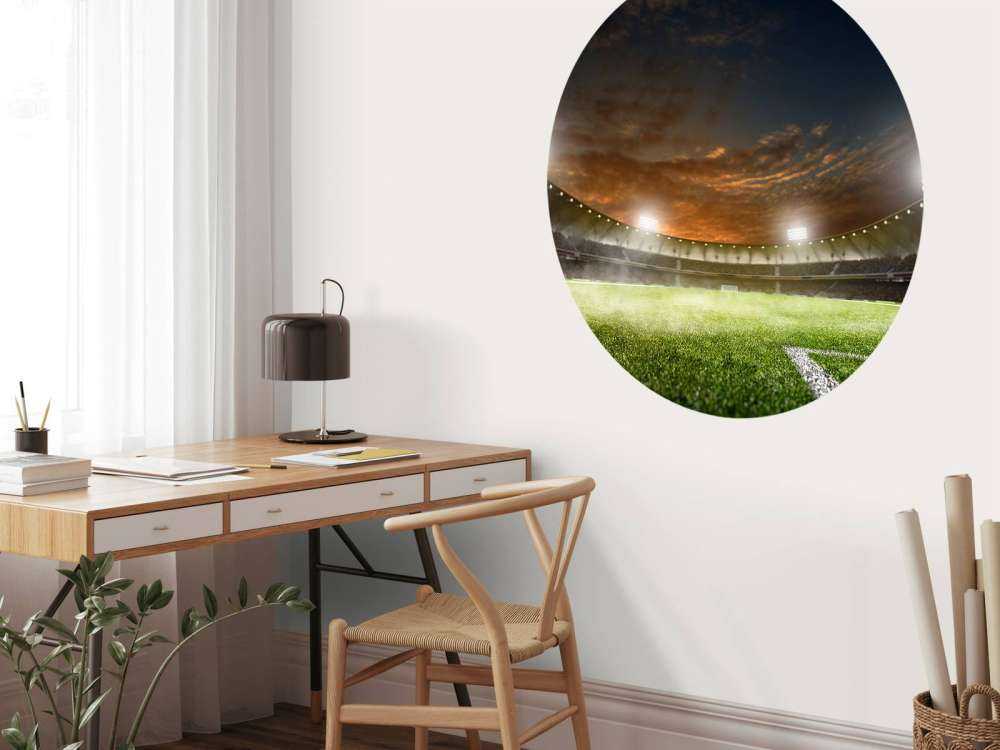 Verlicht voetbalstadion met wolken