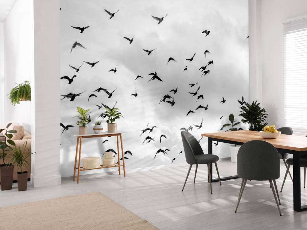 Vliegende duiven in zwart-wit