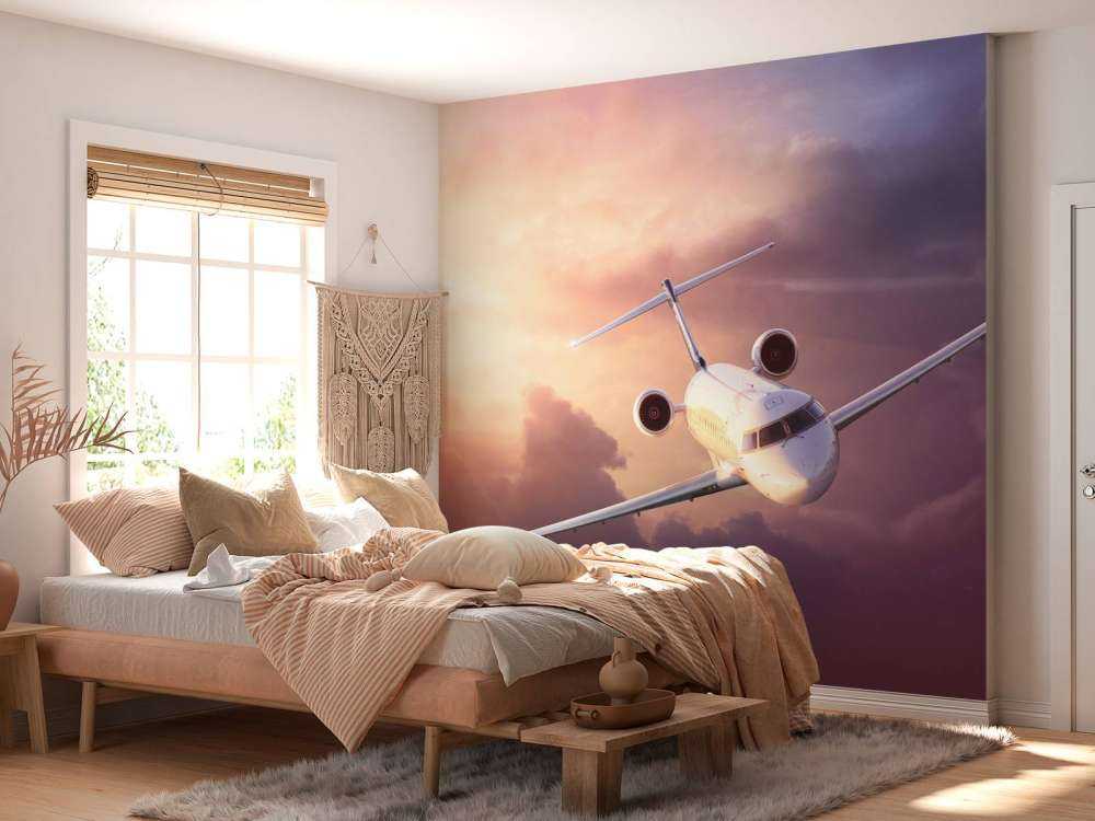 Witte vliegtuig bij zonsondergang