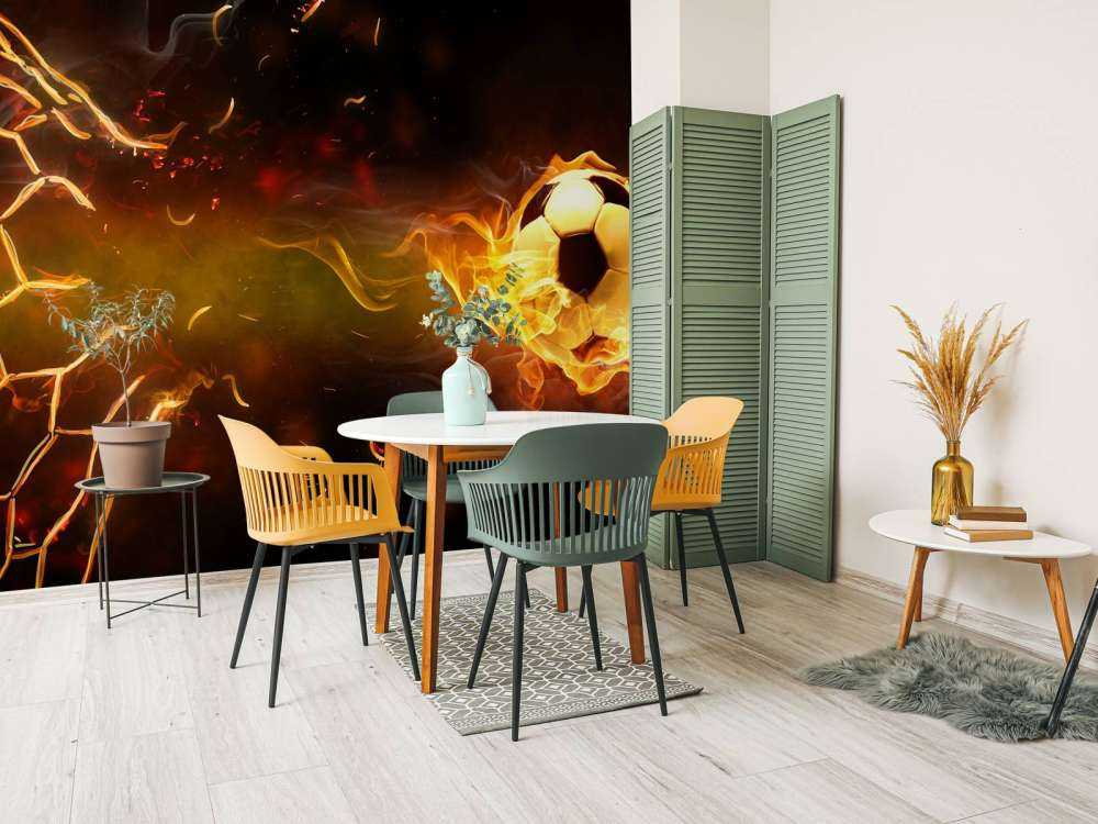 Voetbal brandt door het net