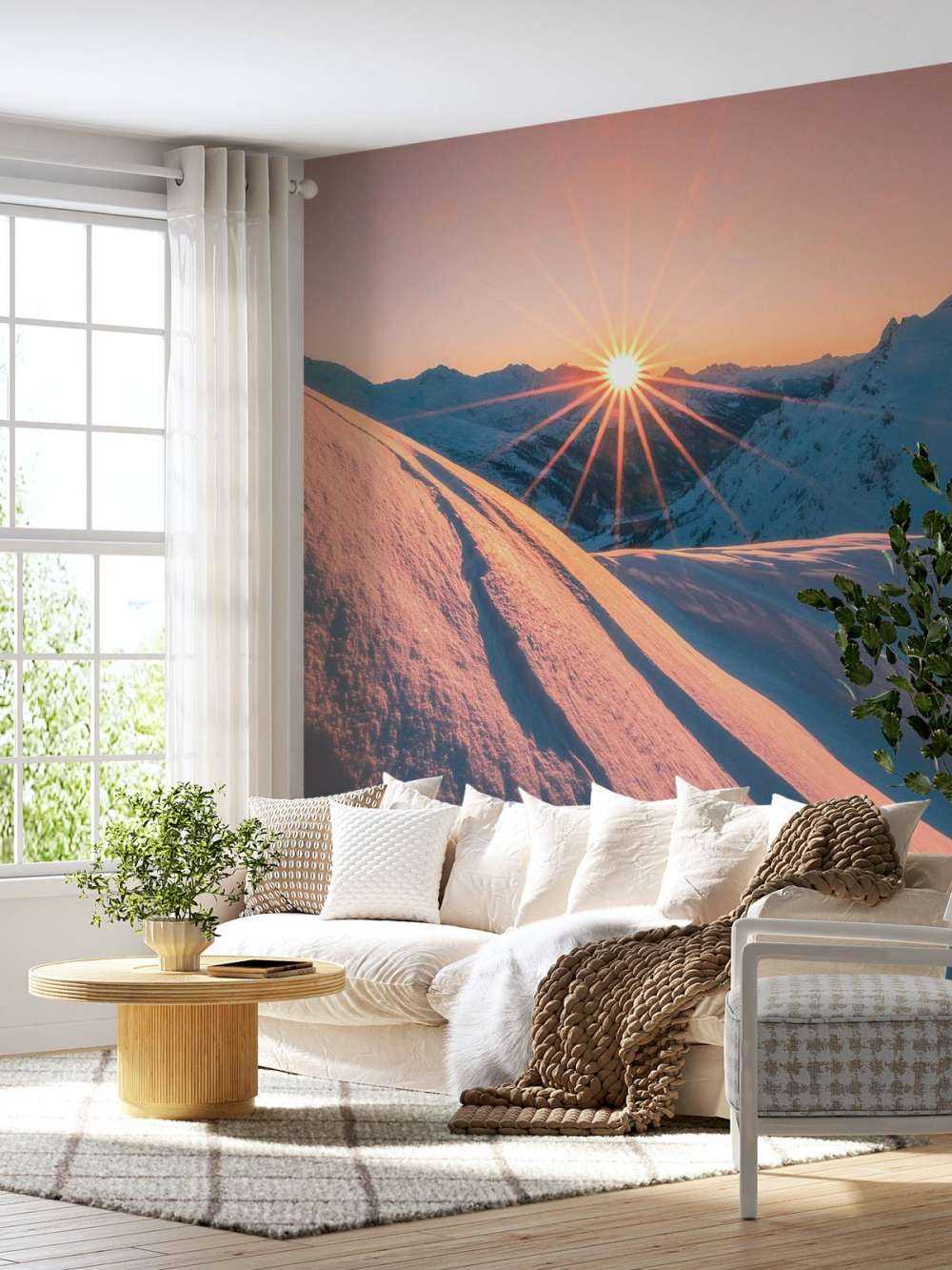 Zonlicht over besneeuwde helling