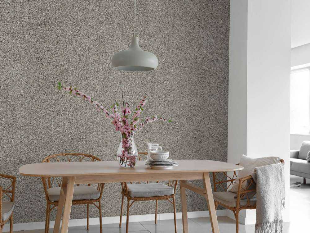 Betonnen muur met fijne steentjes